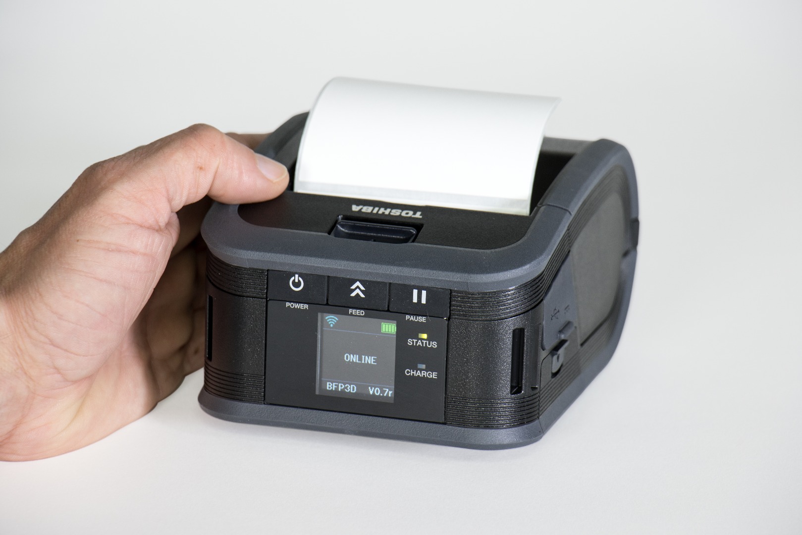 05_B-FP3D_F_with hand and blank label.jpg